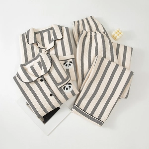Thick quilted air-layer pajamas set with vertical stripes and cute panda pocket detail