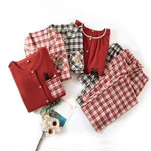 Matching plaid cotton pajama sets for couples featuring cute cartoon animal embroidery