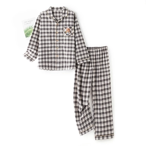 Classic black and white checkered cotton pajama set with cute bear embroidery detail