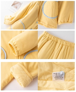 Détails de l'ensemble thermique matelassé jaune pour bébé avec doublure 100% coton