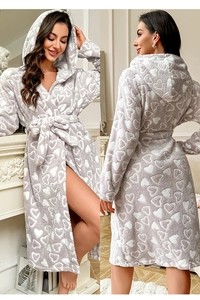Detailed view of gray flannel hooded bathrobe with white heart patterns and waist belt