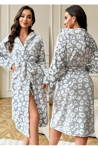 Detail view of winter warm flannel bathrobe with leopard print and cozy hood for women