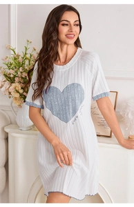 Detail of soft ribbed knit nightdress with blue heart patch and love you embroidery