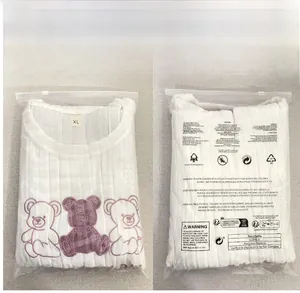 Women's pajama set packaging detail showing XL size tag and cute bear patterns on white fabric