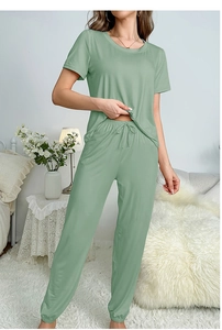 Detail of light green loungewear set with drawstring waistband and ribbed ankle cuffs