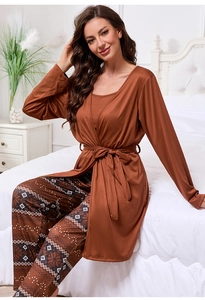 Three-piece women's lounge pajama set in warm caramel red with snowflake print