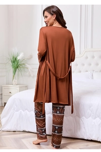 Rear view of three-piece women's pajama set featuring brown robe and printed trousers