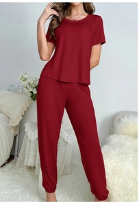 Detail of wine red pajama set with soft knit fabric and comfortable elastic waistband