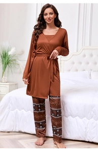Three-piece pajama set with caramel robe and geometric print trousers shown on model