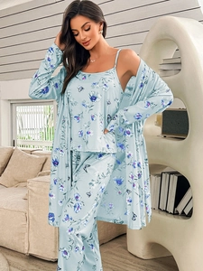Detailed view of light blue loungewear set featuring floral and butterfly patterns