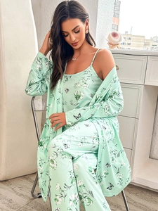 Detailed view of women's 3-piece floral sleepwear set in mint green with silky texture