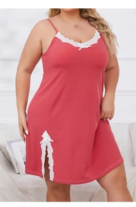 Detailed view of pink plus size sleepwear featuring white lace trim and bow accents