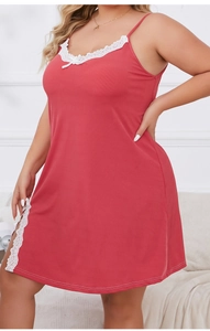 Close-up of red plus size nightgown with white lace trim and small side slit detail
