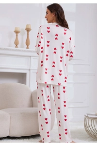 Close-up of soft knit pajamas set with heart patterns showing fabric texture and back fit