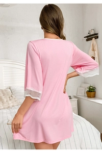 Detailed back view of pink modal nightgown with white lace trim on sleeves