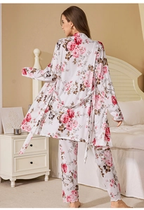 Rear view of floral pajama set featuring a silky robe and trousers with rose patterns