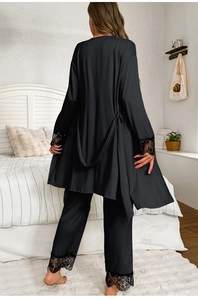 Detailed back view of black pajamas set with floral lace trim on sleeves and cuffs