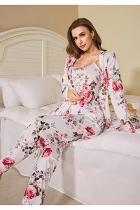 Three-piece women's floral pajamas set with camisole, pants, and robe in rose print