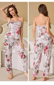 Detailed view of women's 3-piece loungewear with floral print and delicate hemline detail