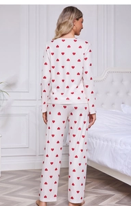 Detail of soft ribbed pajama set featuring heart patterns on long sleeve home wear