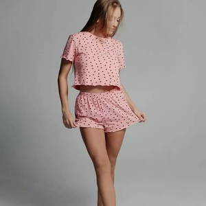 Pink heart print women's two-piece pajama set with short sleeve top and elastic shorts