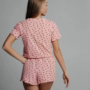 Pink heart print women pajama set with ruffle trim short sleeve top and shorts