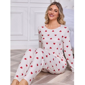 Women's heart print pajama set with long sleeves and ribbed knit texture in beige
