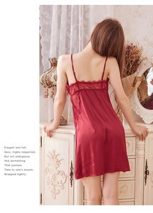Detail of burgundy satin nightgown featuring exquisite lace patchwork on the open back