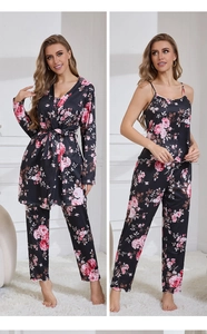 Detailed view of floral satin loungewear set including robe, camisole, and pants