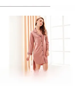 Detail of dusty rose satin sleepshirt with black piping and classic collar design