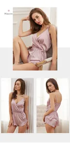 Detail view of mauve satin romper with delicate ruffled hem and elegant crossover V-neckline