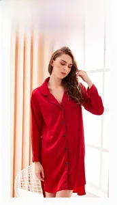 Detailed close-up of the red silk-like robe with H-line cut and elegant lapel collar