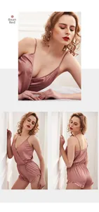 Detail of dusty rose satin camisole set with ruffle trim and drawstring waist shorts