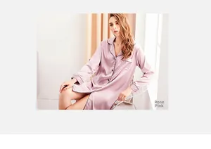 Detail of dusty pink silk satin sleepwear with contrast piping and notch collar