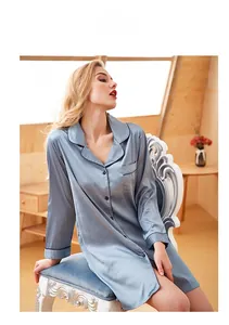 Detail of blue satin women's bathrobe showing contrasting trim and notch lapel