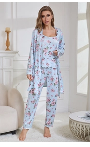 Three-piece pajama set with light blue floral pattern, robe, camisole and pants details