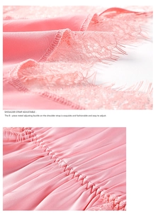Detail of pink silk satin lingerie showing eyelash lace trim and adjustable straps
