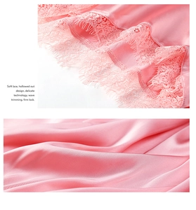 Detail of pink satin sleepwear featuring delicate lace trim and wave-cut scalloped edges