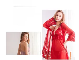 Detailed view of red lace embroidery and sheer mesh fabric on a sexy nightgown set