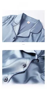 Close-up of light blue satin sleepwear featuring a V-neck, contrast piping, and blue buttons
