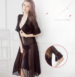 Macro shot of a black sheer mesh robe featuring lace trim and elegant ruffle cuffs