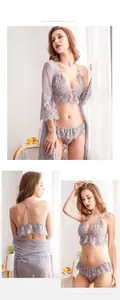 Detailed view of light purple lace lingerie set with matching sheer robe on a model