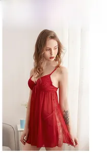 Detail of red lace lingerie nightgown with sheer mesh fabric and deep V-neckline