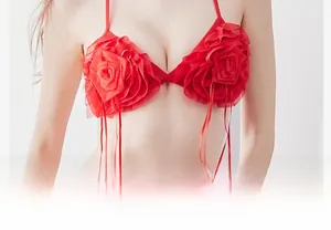 Detail of red rose petal-shaped mesh bra with three-dimensional layered lace design