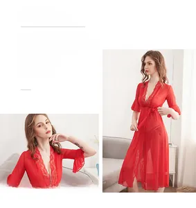 Detail of red sheer mesh robe with floral lace trim and elegant waist tie closure