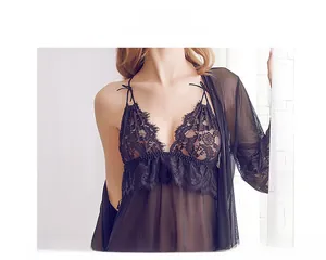 Detail view of black lace lingerie set with V-neck babydoll and sheer mesh cardigan
