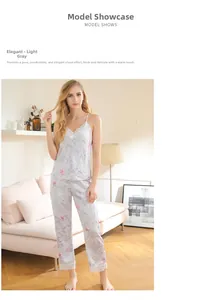 Detail of light grey pajama set with pink floral prints and delicate lace trim accents