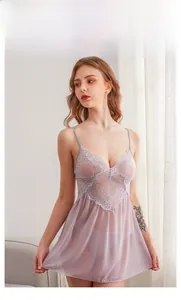 Detailed close-up of lavender mesh babydoll dress with intricate floral lace and V-neckline