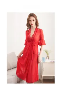 Detail of a bright red sheer mesh lingerie robe with delicate lace trim and v-neck design