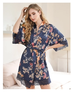 Detailed view of dark blue floral satin robe with elegant eyelash lace trim on sleeves